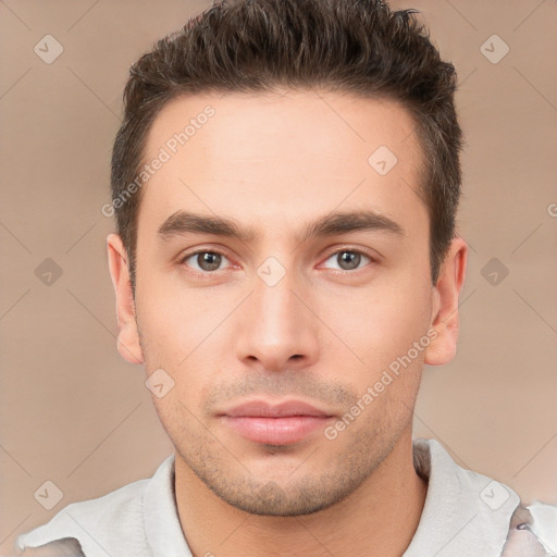 Neutral white young-adult male with short  brown hair and brown eyes