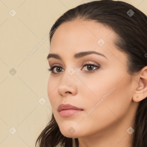 Neutral white young-adult female with long  brown hair and brown eyes