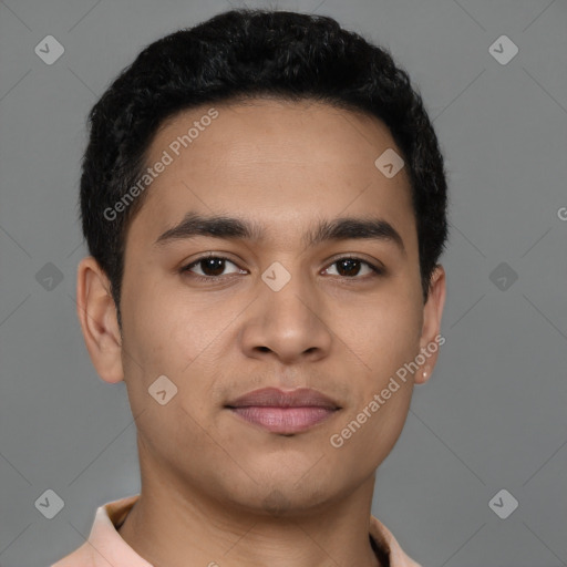 Joyful latino young-adult male with short  brown hair and brown eyes