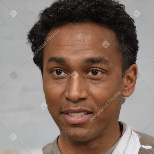 Joyful latino adult male with short  black hair and brown eyes