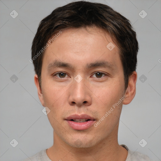 Neutral asian young-adult male with short  brown hair and brown eyes