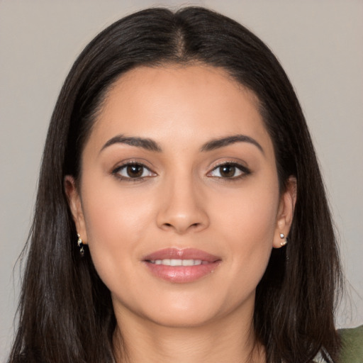 Joyful white young-adult female with long  black hair and brown eyes