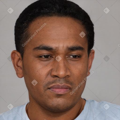 Neutral latino young-adult male with short  black hair and brown eyes