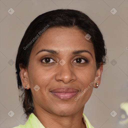 Joyful white adult female with medium  brown hair and brown eyes