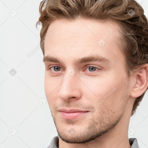 Neutral white young-adult male with short  brown hair and grey eyes