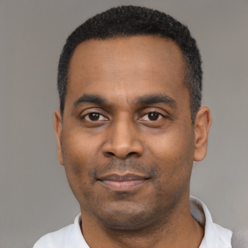 Neutral black young-adult male with short  black hair and brown eyes
