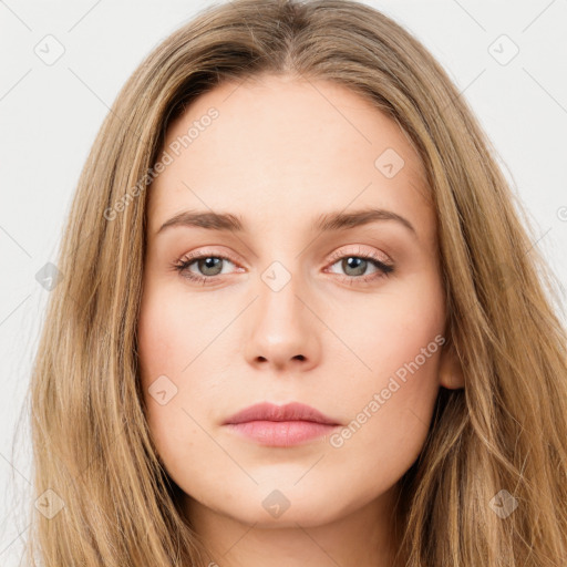 Neutral white young-adult female with long  brown hair and brown eyes