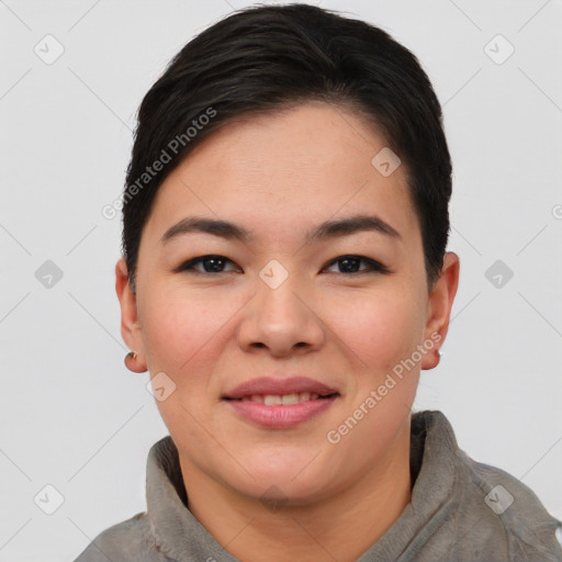 Joyful asian young-adult female with short  brown hair and brown eyes