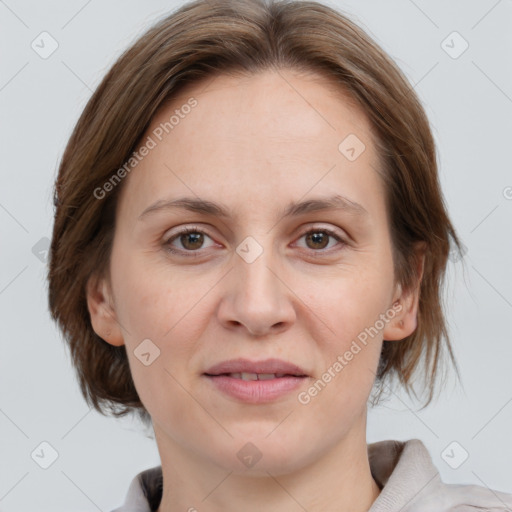 Joyful white adult female with medium  brown hair and grey eyes