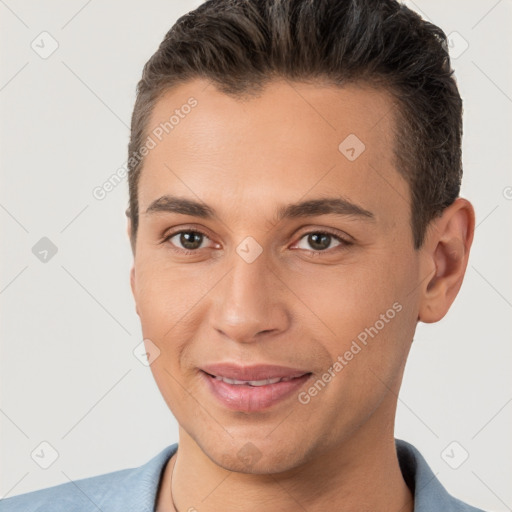 Joyful white young-adult male with short  brown hair and brown eyes