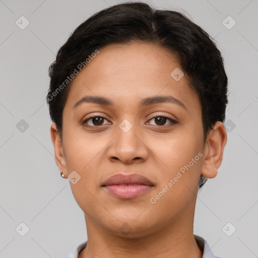 Joyful latino young-adult female with short  brown hair and brown eyes