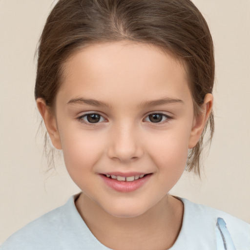 Joyful white child female with medium  brown hair and brown eyes