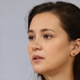 Neutral white young-adult female with short  brown hair and brown eyes