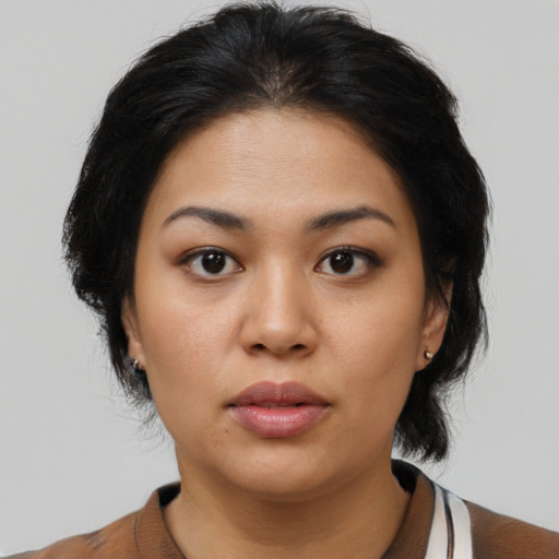 Neutral asian young-adult female with medium  black hair and brown eyes