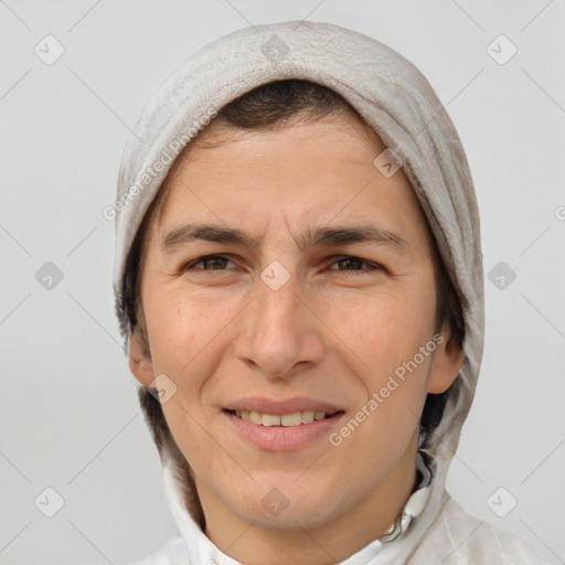 Joyful white adult female with short  brown hair and brown eyes