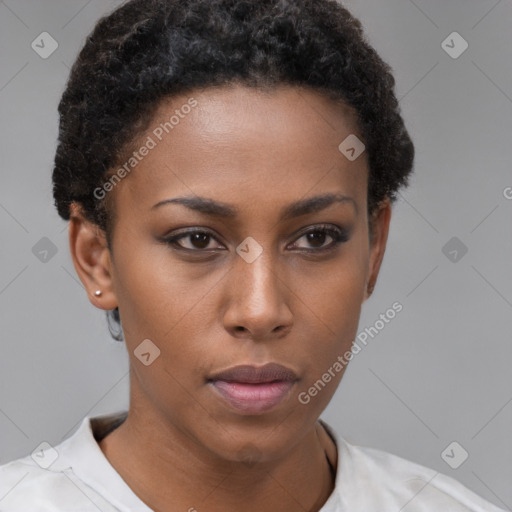 Neutral black young-adult female with short  brown hair and brown eyes