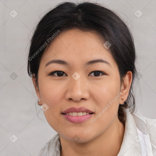 Joyful asian young-adult female with medium  brown hair and brown eyes