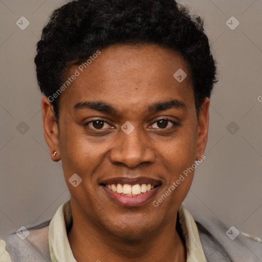 Joyful black young-adult male with short  black hair and brown eyes