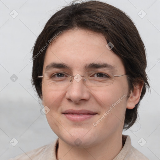 Joyful white adult female with medium  brown hair and brown eyes