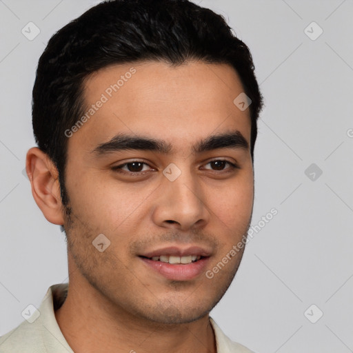 Joyful white young-adult male with short  black hair and brown eyes