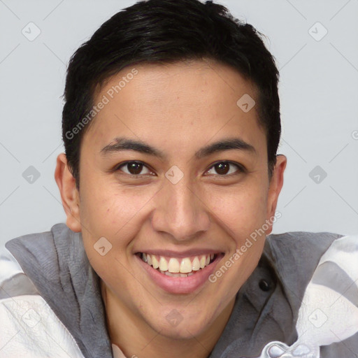 Joyful latino young-adult male with short  brown hair and brown eyes