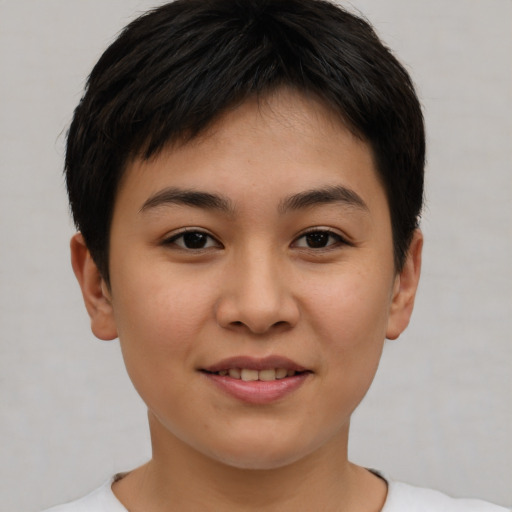 Joyful asian young-adult female with short  brown hair and brown eyes