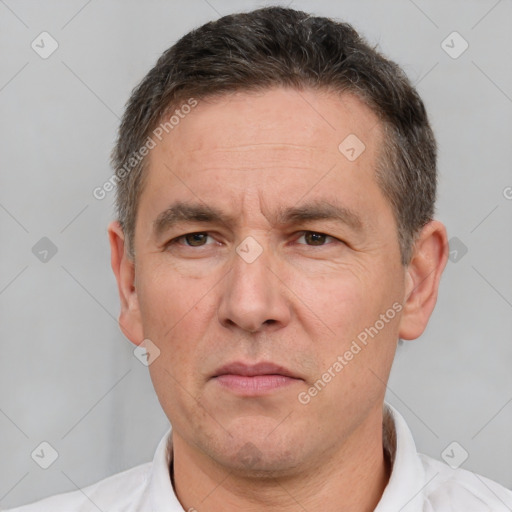 Neutral white adult male with short  brown hair and brown eyes