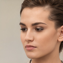 Neutral white young-adult female with medium  brown hair and brown eyes