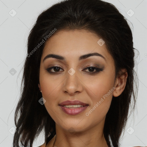 Joyful latino young-adult female with long  brown hair and brown eyes