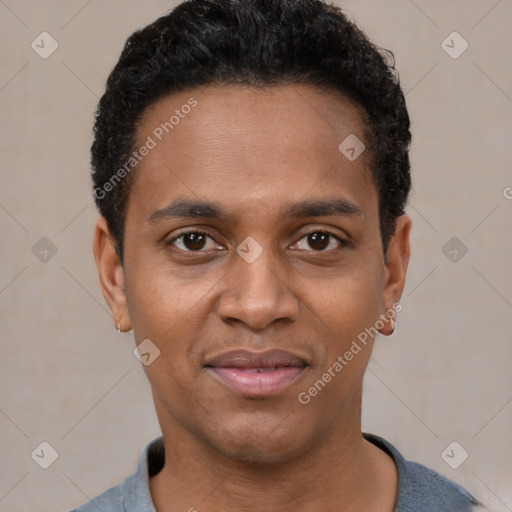 Joyful black young-adult male with short  black hair and brown eyes