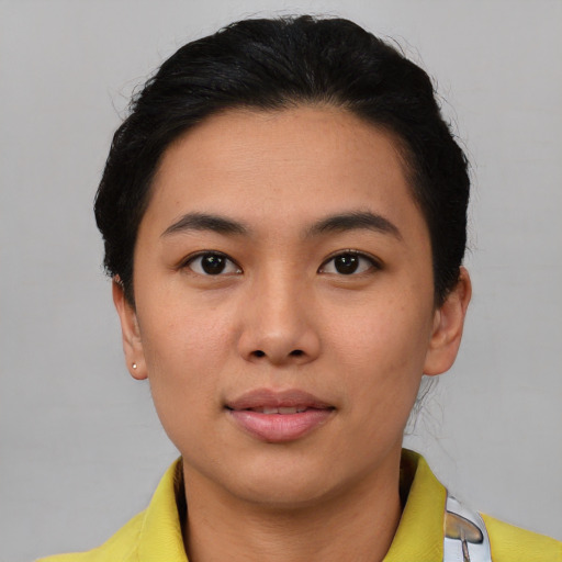 Neutral asian young-adult female with short  black hair and brown eyes