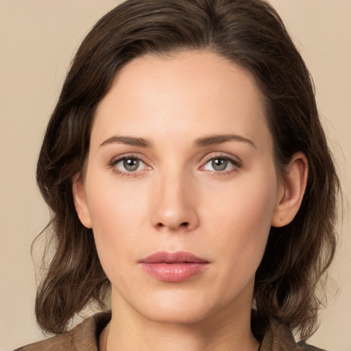 Neutral white young-adult female with medium  brown hair and brown eyes