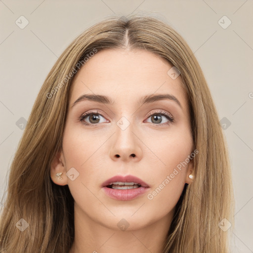 Neutral white young-adult female with long  brown hair and brown eyes