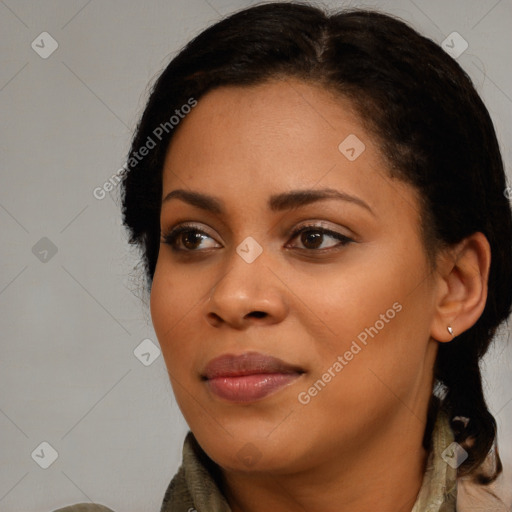 Joyful black young-adult female with long  brown hair and brown eyes