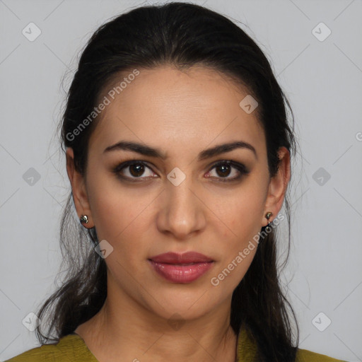 Joyful latino young-adult female with long  brown hair and brown eyes