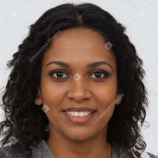 Joyful black young-adult female with long  brown hair and brown eyes