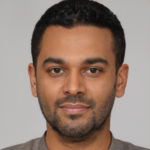 Neutral latino young-adult male with short  black hair and brown eyes
