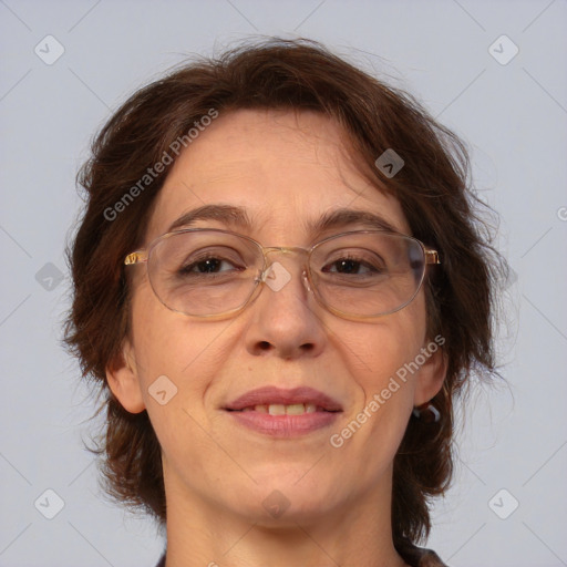 Joyful white adult female with medium  brown hair and brown eyes