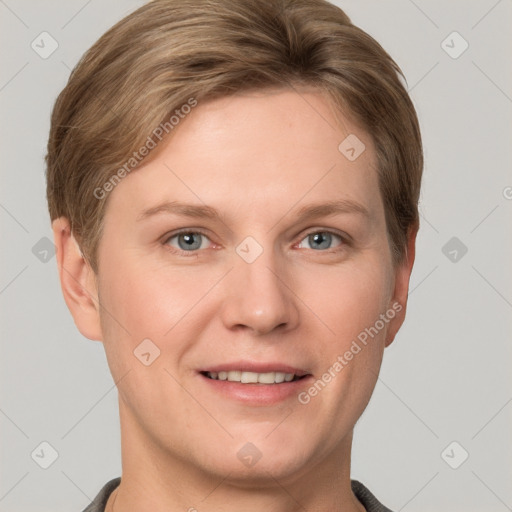 Joyful white young-adult female with short  brown hair and grey eyes