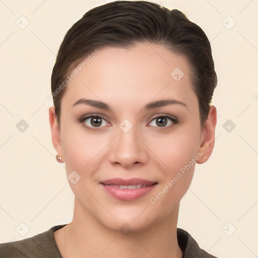 Joyful white young-adult female with short  brown hair and brown eyes