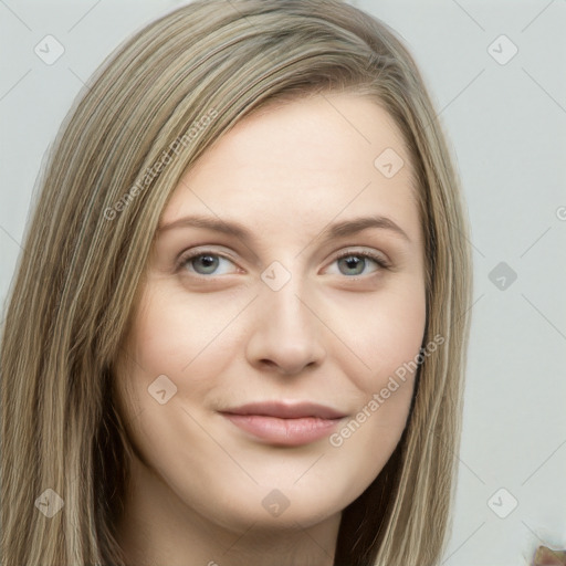 Joyful white young-adult female with long  brown hair and green eyes