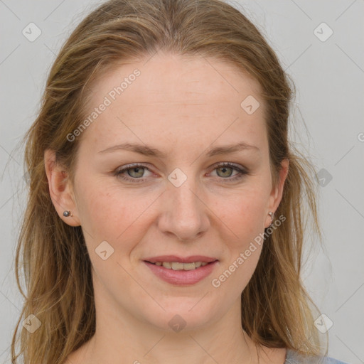 Joyful white adult female with medium  brown hair and grey eyes