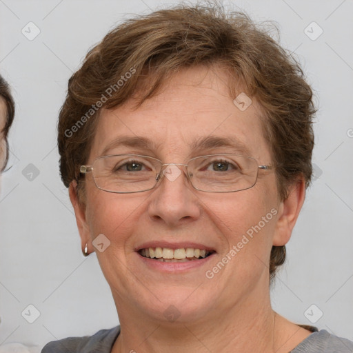 Joyful white adult female with short  brown hair and grey eyes