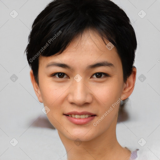 Joyful asian young-adult female with short  black hair and brown eyes