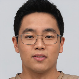 Neutral asian young-adult male with short  brown hair and brown eyes