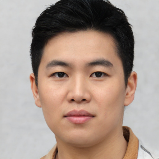 Neutral asian young-adult male with short  black hair and brown eyes