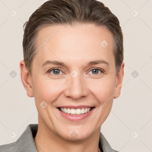 Joyful white young-adult female with short  brown hair and grey eyes