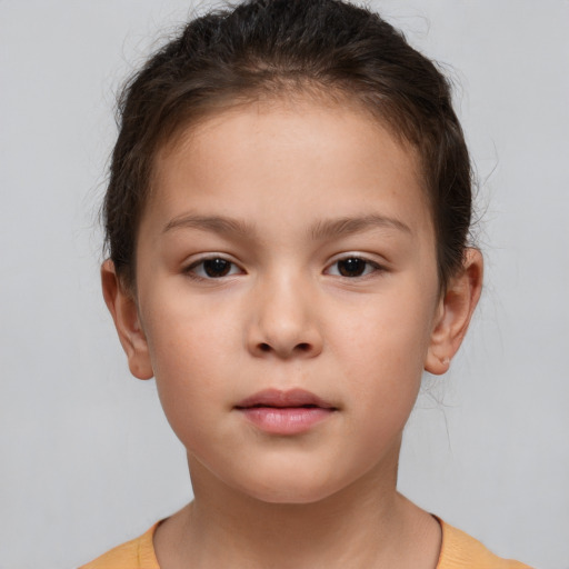 Neutral white child female with short  brown hair and brown eyes