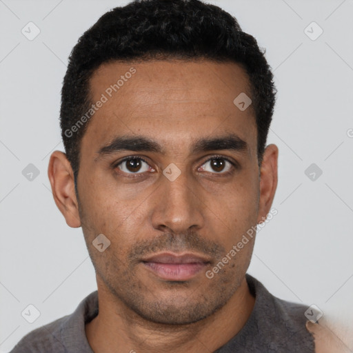 Neutral black young-adult male with short  black hair and brown eyes