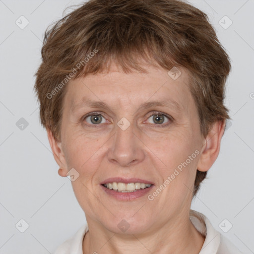 Joyful white adult female with short  brown hair and brown eyes